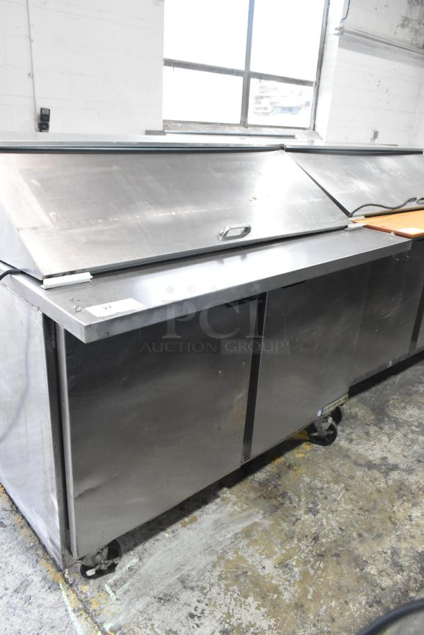 Beverage Air SPE48-18M-HMP stainless steel prep table, good condition, commercial casters, 115V, 1 phase, visible label.