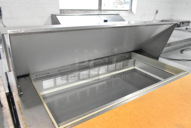 Beverage Air stainless steel commercial sandwich salad prep table, Bain Marie on casters. Good condition, 115V, 1 phase.