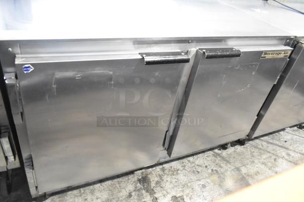 Beverage Air UCR48A stainless steel undercounter cooler with two doors, commercial casters. 115 volts, 1 phase, visible brand label.