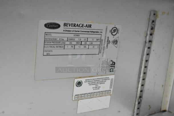 Beverage Air UCR48A label showing model, refrigerant, design pressure, and electrical ratings; 115 volts, 1 phase.