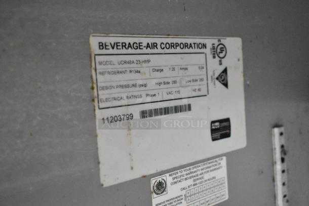 Beverage Air UCR48A-23-HMP commercial cooler label showing model, refrigerant type, design pressure, and electrical ratings.