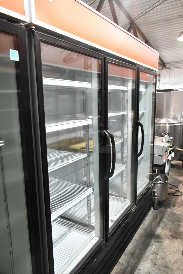 Master-Bilt MBGRP74-HG commercial 3-door reach-in cooler, metal finish, poly coated racks, 115/208-240V, excellent condition.