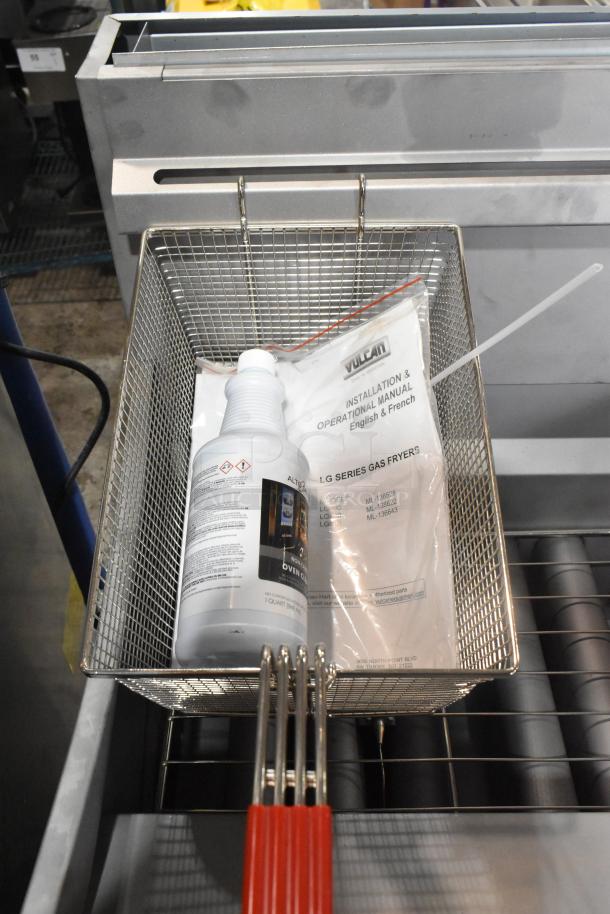 BRAND NEW Vulcan LG500-1 stainless steel deep fryer with metal fry basket, 150,000 BTU, gas-powered, includes manual.