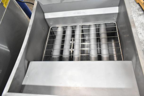 BRAND NEW Vulcan LG500-1 stainless steel commercial deep fat fryer, natural gas, 150,000 BTU, with metal fry basket, minor scratches.