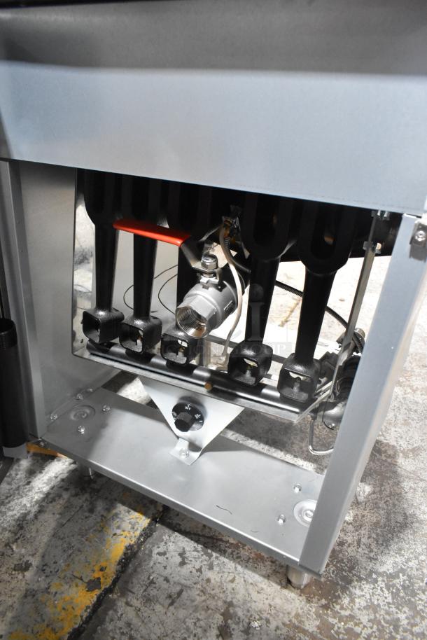 BRAND NEW Vulcan LG500-1 stainless steel commercial deep fat fryer. Natural gas-powered, 150,000 BTU. Includes metal fry basket.