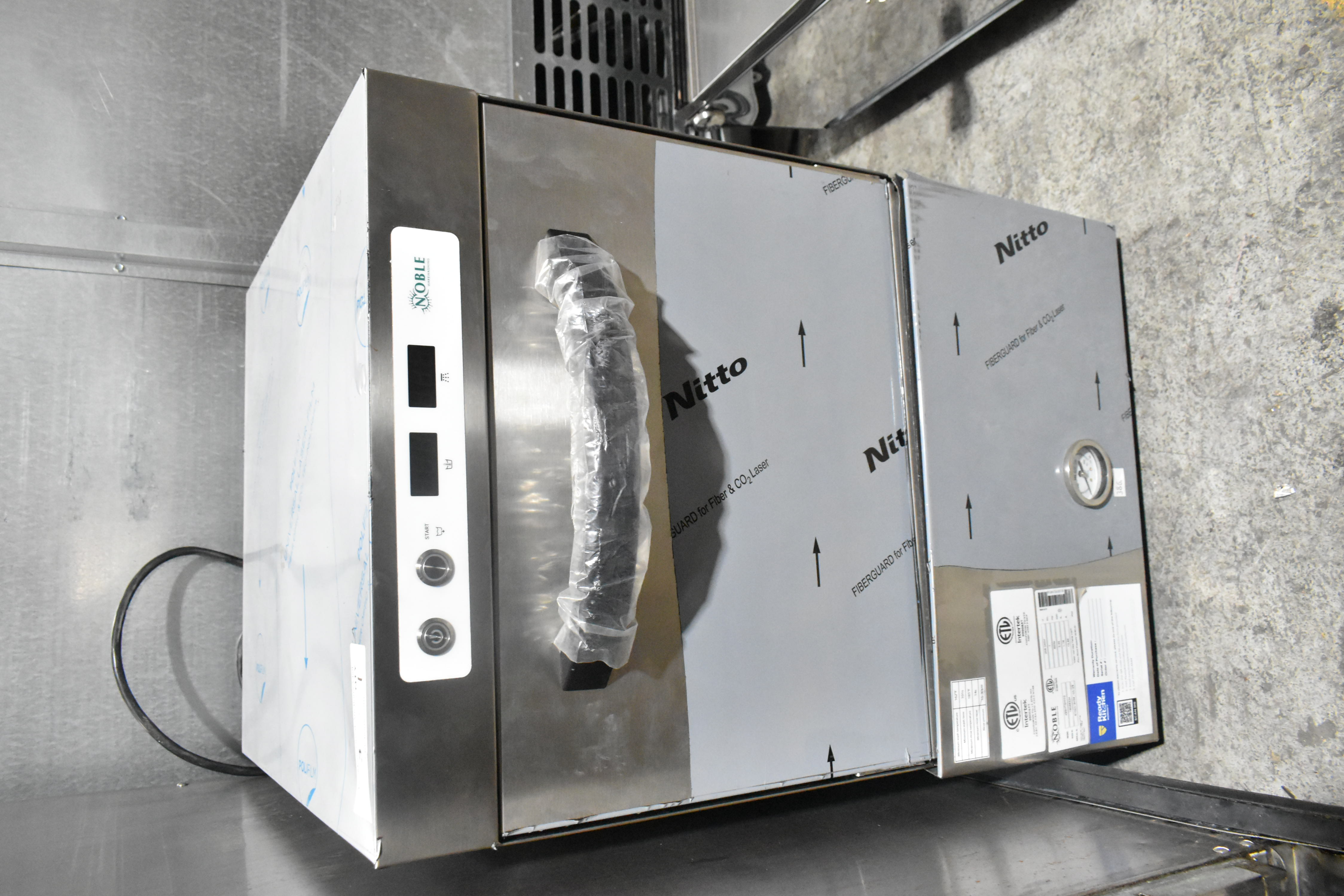 Noble Warewashing undercounter dishwasher showing scratch and dent cosmetic damage