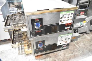 2 Middleby Marshall CTX DZ33I conveyor pizza ovens, stainless steel, electric, 208 volts, on casters, in used condition.