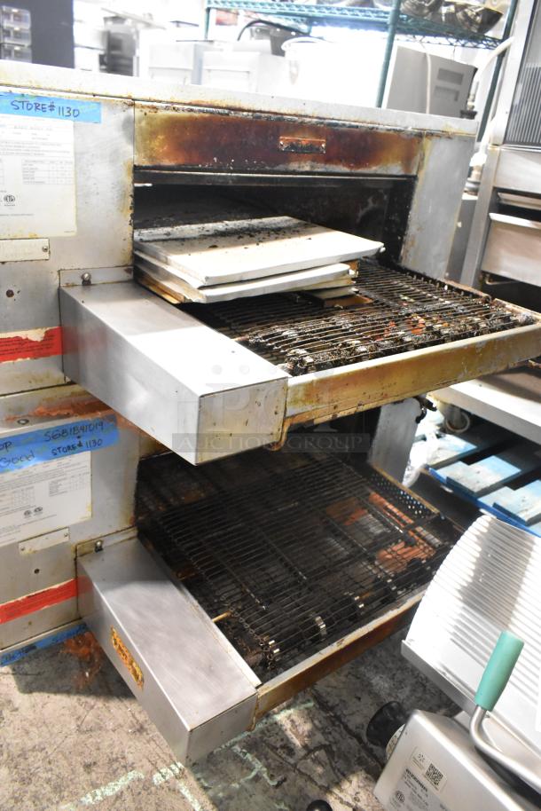 Two 2023 Middleby Marshall CTX DZ33I stainless steel conveyor pizza ovens on casters, pre-owned, electric, 208V.