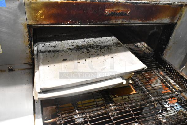 Middleby Marshall CTX DZ33I stainless steel conveyor pizza ovens, commercial casters, used condition, 208V, 3/1 phase.