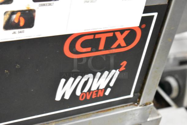 CTX Wow! Oven label on Middleby Marshall DZ33I commercial pizza oven; stainless steel, electric, 208V, 3/1 phase.