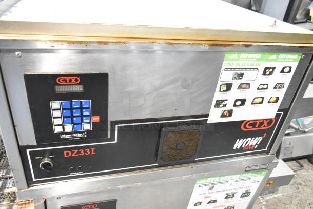 Two 2023 Middleby Marshall CTX DZ33I stainless steel conveyor pizza ovens on casters. Electric, 208 Volts, 3/1 Phase.