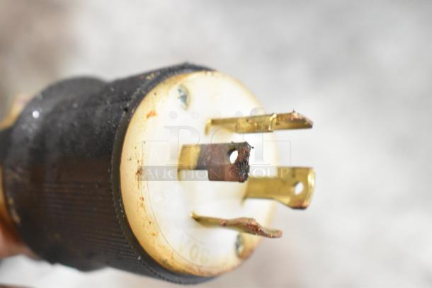 Close-up of a plug connector, possibly damaged, from a 2023 Middleby Marshall CTX DZ33I commercial pizza oven.