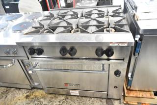 Brand new Wolf C36S-6BP commercial stainless steel 6-burner propane range with oven, scratch and dent condition.