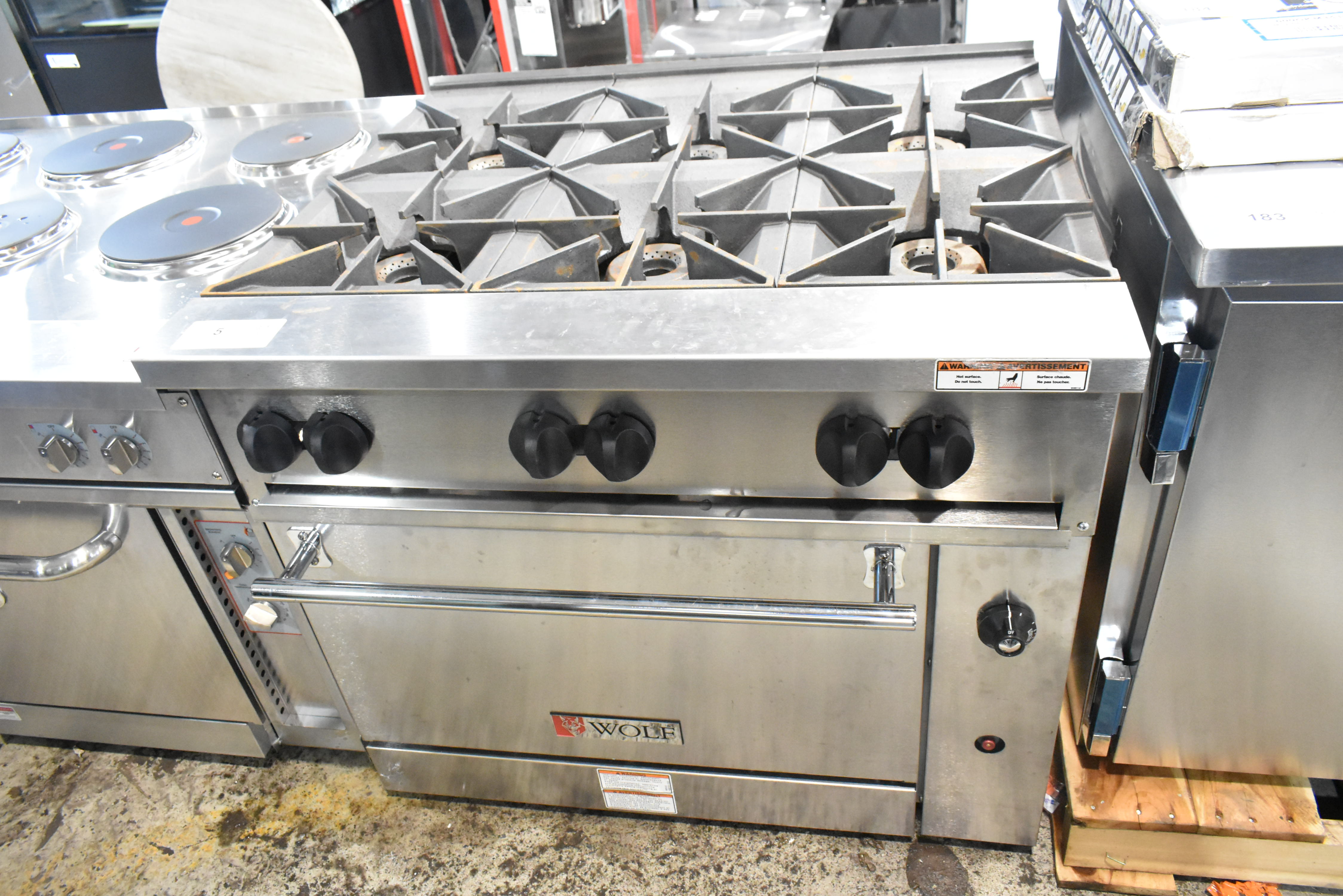 Brand new scratch and dent Wolf commercial 6-burner range - premium build quality