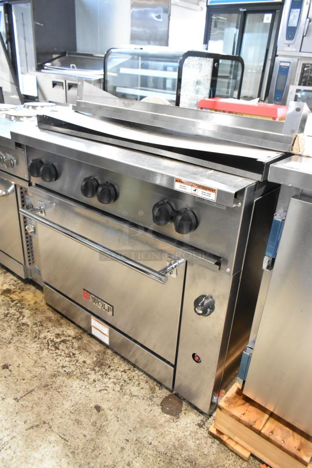 Wolf C36S-6BP 6-burner stainless steel commercial range with oven; propane gas, new, minor scratches.