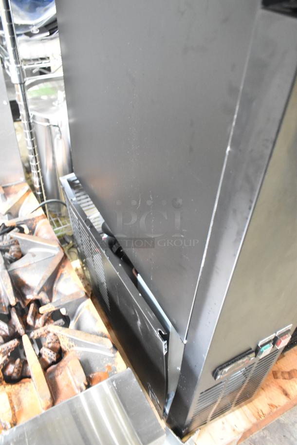 Brand new Avantco 178UBB72SHC back bar refrigerator with sliding glass door; 73" black metal, LED lighting, 115V, 1 phase.