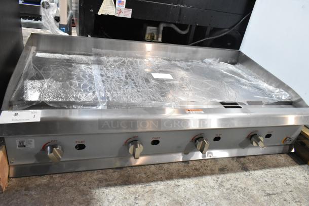 BRAND NEW Cooking Performance Group 48" stainless steel gas griddle, model 351GMCPG48NL, 120,000 BTU, manual controls.