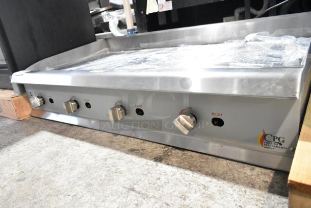BRAND NEW 2024 Cooking Performance Group 48" stainless steel griddle, natural gas, 120,000 BTU, manual controls, minor dents.