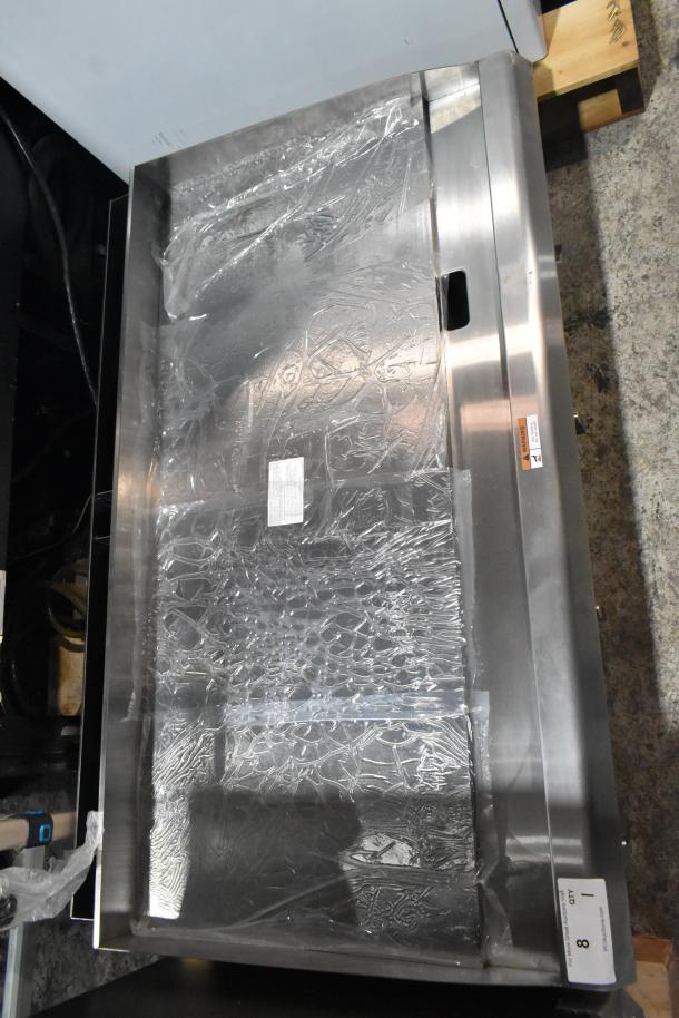 BRAND NEW Cooking Performance Group 48" stainless steel gas griddle, model 351GMCPG48NL, 120,000 BTU, scratch and dent.