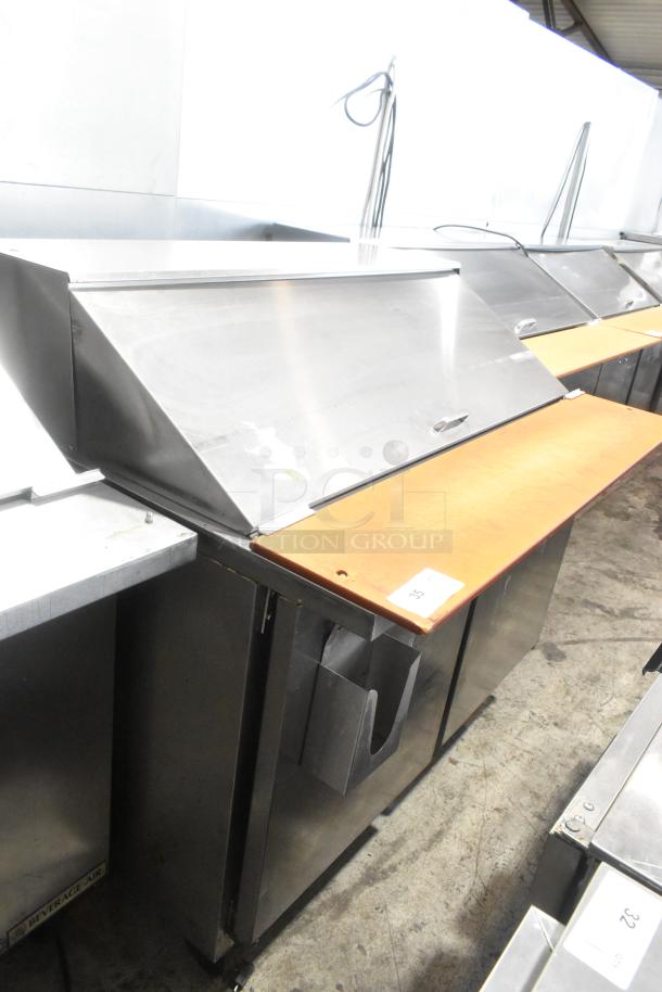 Beverage Air SPE48-18M stainless steel sandwich salad prep table, bain marie style, with commercial casters, 115V.