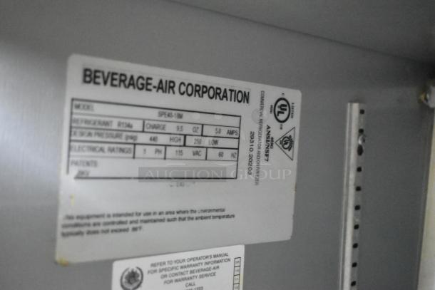 Beverage Air SPE48-18M stainless steel sandwich salad prep table, label shows model SPE48-18M, 115V, 1 phase, UL listed.