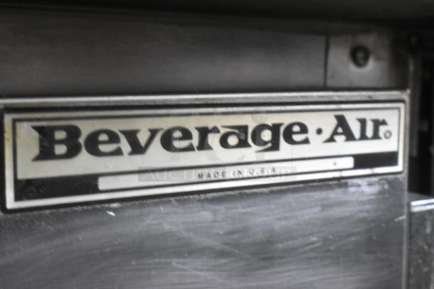 Beverage Air SPE48-18M stainless steel sandwich prep table, 115V, 1 phase, on casters. Label indicates "Made in U.S.A."