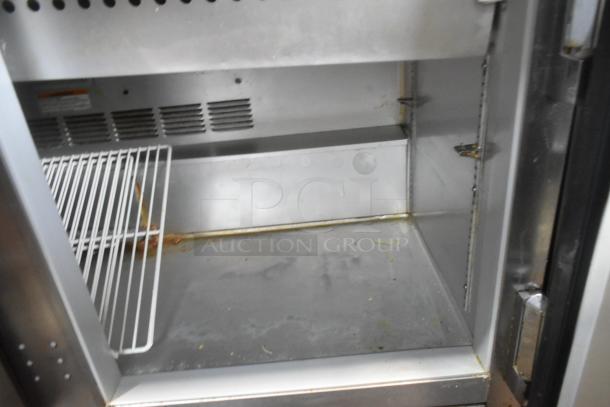 Beverage Air SPE48-18M stainless steel prep table interior, showing wire shelf and stainless surfaces. 115 volts, 1 phase.