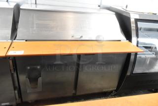 Beverage Air SPE48-18M-HMP stainless steel prep table with bain marie, commercial casters, and 115V, 1 Phase.