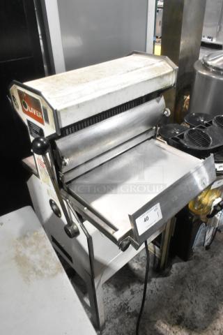 Oliver 777 metal commercial bread loaf slicer, 115V, 1 phase. Visible wear, Oliver branding on the side, large slicer tray.
