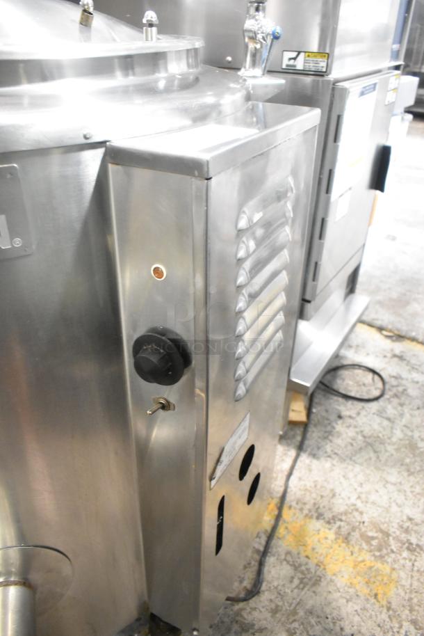 Groen HH/4-40 stainless steel 40-gallon steam kettle. Features controls and vents. Ideal for commercial kitchens.