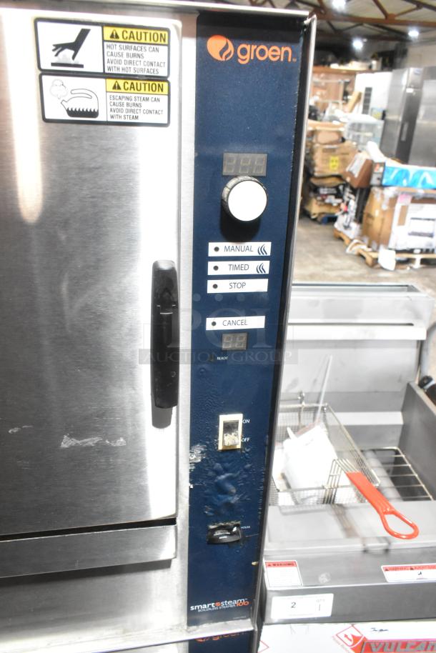 Groen SSB-5GF stainless steel steam cabinet, propane powered, 58,000 BTU, manual and timed controls, warning labels visible.