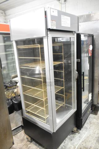 Hatco RFST-1K commercial heated holding cabinet with glass doors, metal shelves, and caster wheels. 120V, 1-phase.