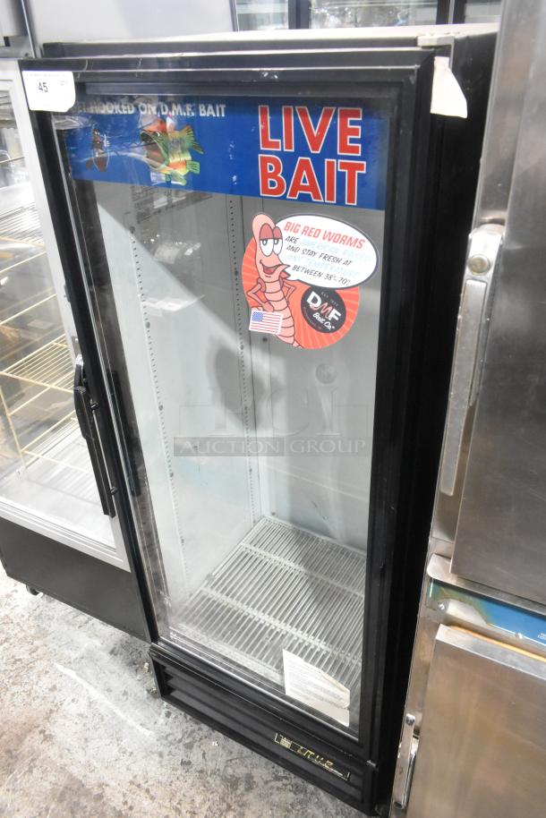 True GDM-12 metal commercial single-door cooler with glass front, poly-coated racks, and live bait signage. 115 volts, 1 phase.