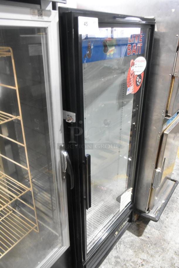 True GDM-12 metal single door cooler, poly-coated racks, 115 volts, live bait signage, used condition.