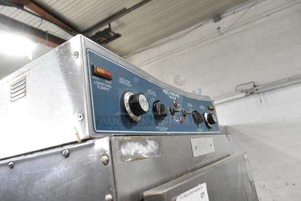 Alto Shaam 1000-TH-I Halo Heat stainless steel commercial oven, visible controls, on casters, 208-240V, 1 phase.