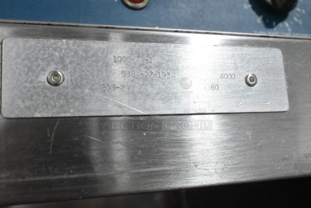 Alto Shaam 1000-TH-I Halo Heat stainless steel Cook and Hold oven label, showing voltage and model details.