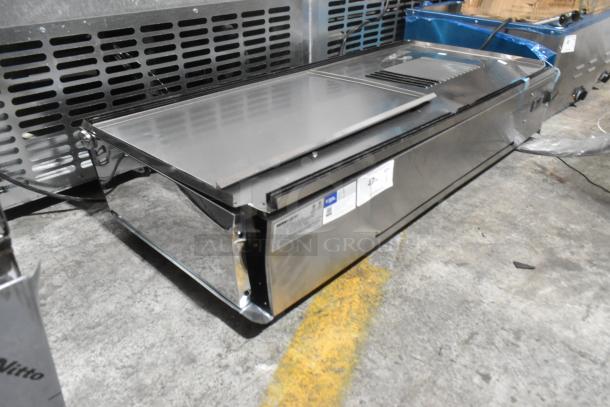 ServIt 423HDM48SA stainless steel 48" countertop heated display case, features sliding doors, 3 shelves, 120V, 1 phase.