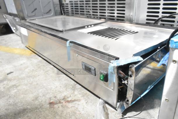 ServIt 423HDM48SA stainless steel heated display case, 48", 3 shelves, sliding doors, 120V, 1 phase, slight corner dent.