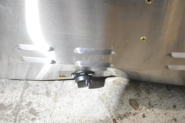 BRAND NEW SCRATCH AND DENT! 2024 Avantco 177STE4SA Stainless Steel 4 Bay Steam Table. Knob and surface visible.