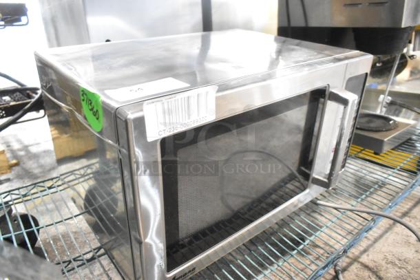 Amana RCS10TS stainless steel commercial microwave oven, 120 volts, visible labels, good condition.