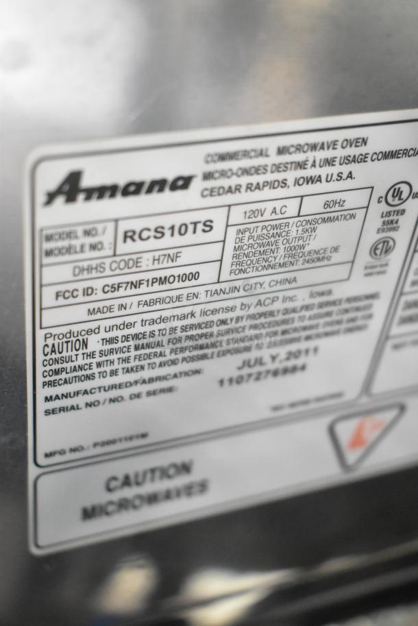 Amana RCS10TS stainless steel commercial microwave, model RCS10TS, 120V, 1 phase, showing label with specifications.