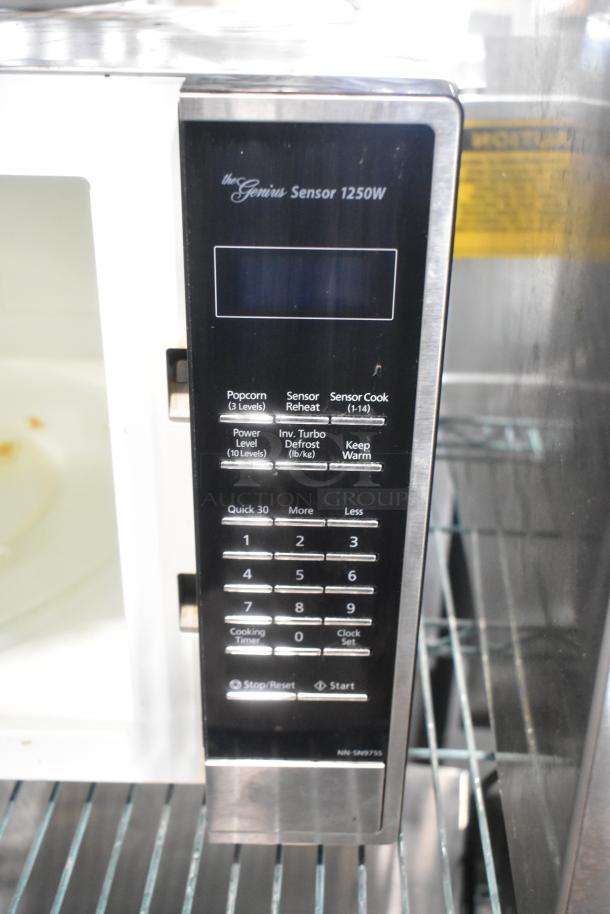 The Genius Stainless Steel Countertop Microwave Oven, 1250W, sensor features, keypad controls, model NN-SN975S.