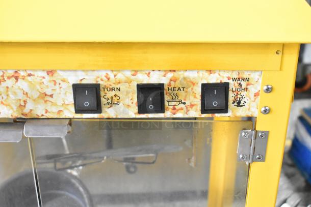 2019 OY-828 Popcorn Machine, yellow metal, commercial countertop model, 110V, 1 phase, features turn, heat, and light controls.