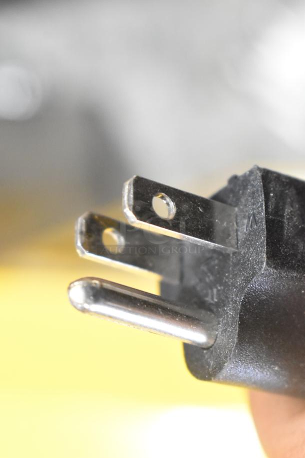Close-up of a plug for the 2019 OY-828 Metal Commercial Countertop Popcorn Machine, 110V, 1 Phase.