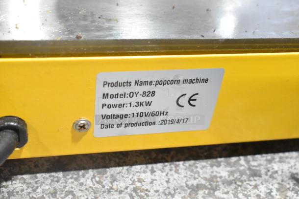 2019 OY-828 Metal Commercial Popcorn Machine, 110V, 1 Phase. Label indicates model, power 1.3KW, production date 2019/4/17.