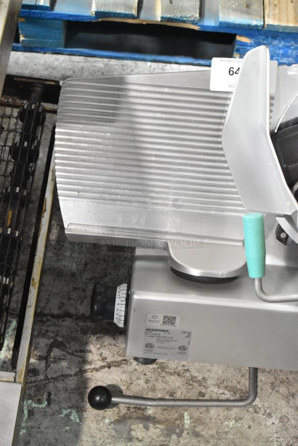 2016 Bizerba GSP HD metal commercial meat slicer, 120V, 1 phase. Features manual controls and sturdy design, label visible.