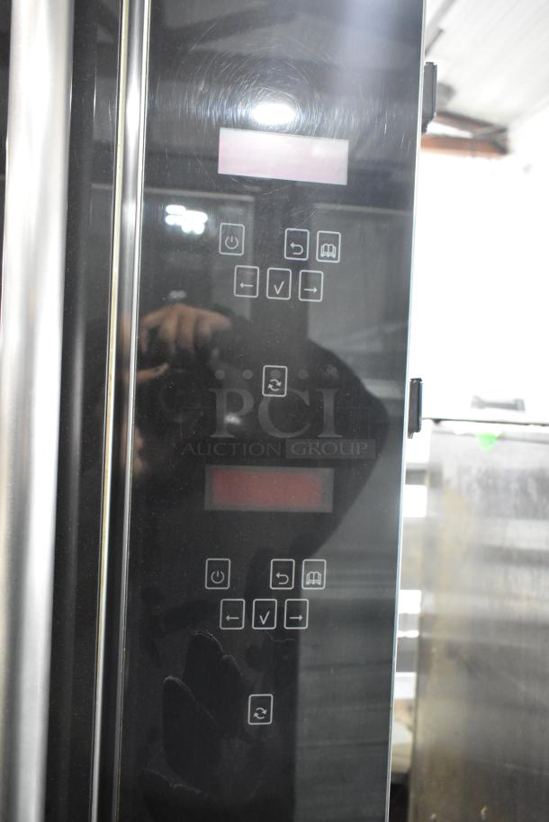 Fri-jado TDR7+7P stainless steel electric rotisserie oven, digital controls visible, on commercial casters.