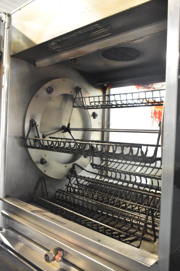 Fri-jado TDR7+7P stainless steel electric rotisserie oven on casters, 208V, 3-phase, used, commercial-grade, interior view.