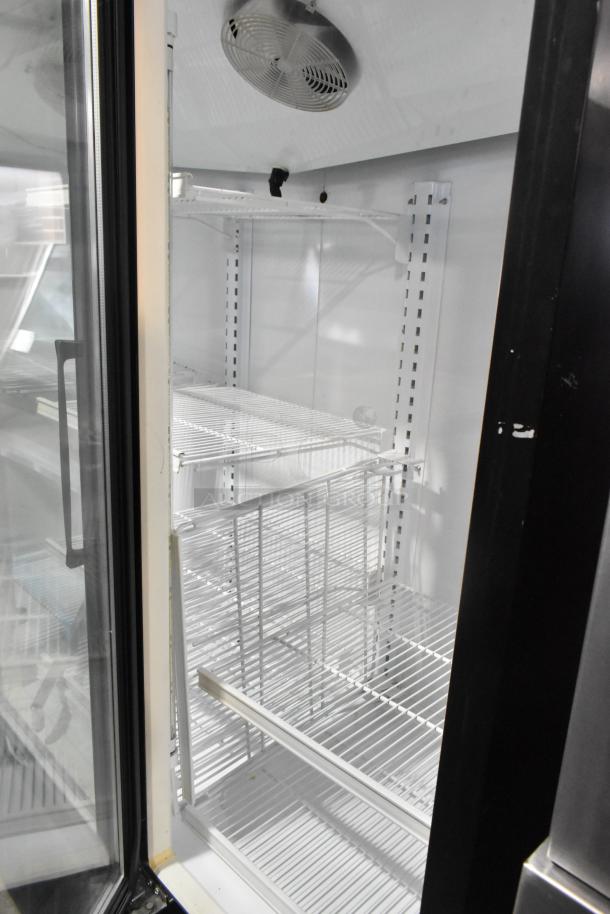 Master-Bilt BLG-74HD commercial freezer, 3-door, metal, poly-coated racks, 115/208-230V, 1 phase, clean interior view.