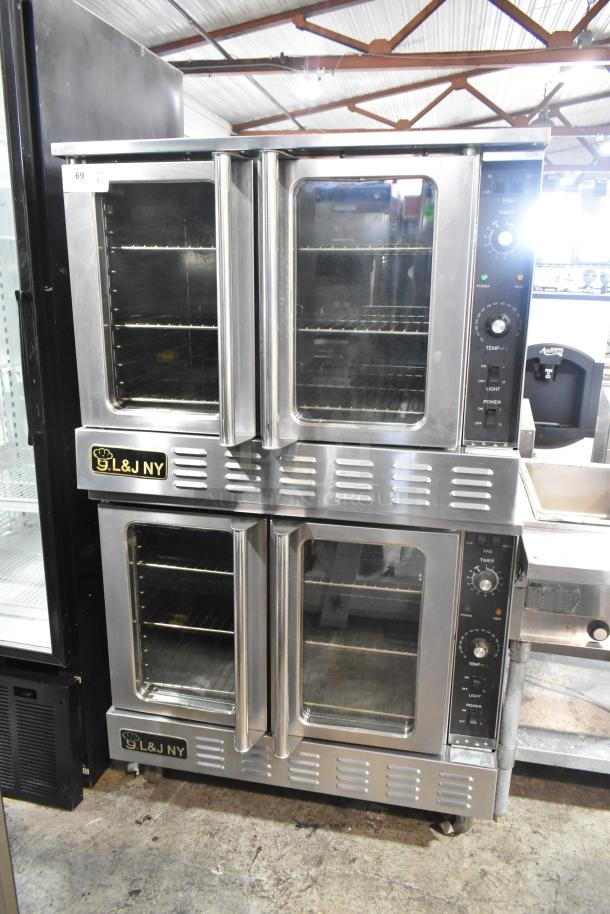 Dual L&J NY stainless steel full-size convection ovens with view-through doors, metal racks, and thermostatic controls on casters.